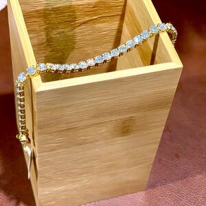 Moissanite (Rnd 5mm) Tennis Bracelet in Vermeil YG over Sterling Silver (8 in)